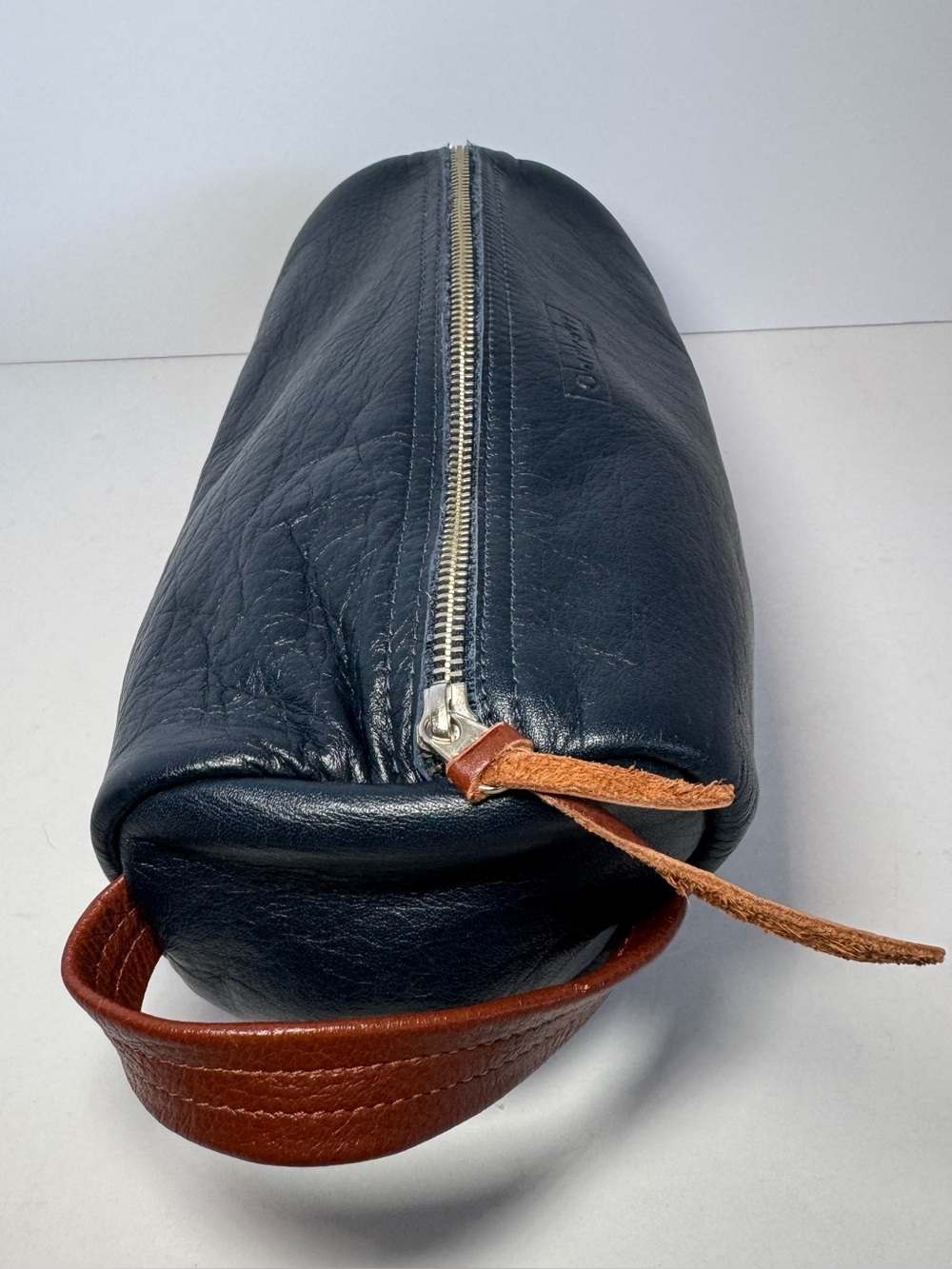 Garrett leather navy blue leather toiletry bag